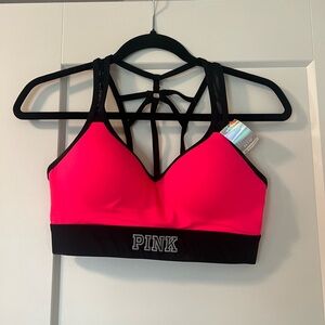 Pink Victoria’s Secret sports bra. Size XS